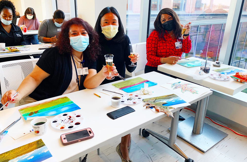 Staff members participate in Sip & Paint, one in a series of “Thankful for You” events sponsored throughout November by Penn Medicine Princeton Health.